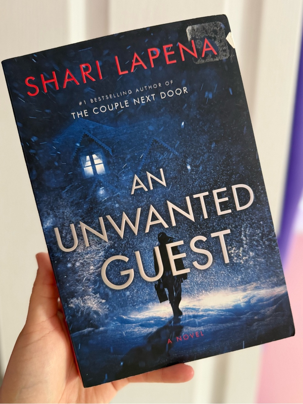 Book - An unwanted guest by Shari Lapena